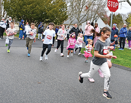 Nearly 200 take to street in West Island race